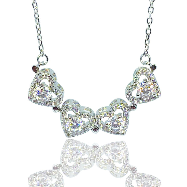 Sterling Silver Four-Leaf Clover Necklace: Moissanite Heart Pendant